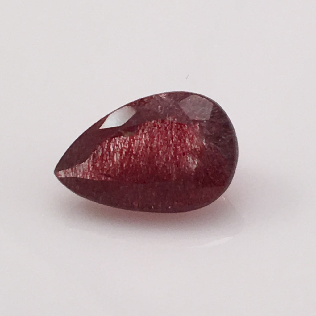 7.3 carat Speckled Strawberry Rutile Gemstone - Colonial Gems