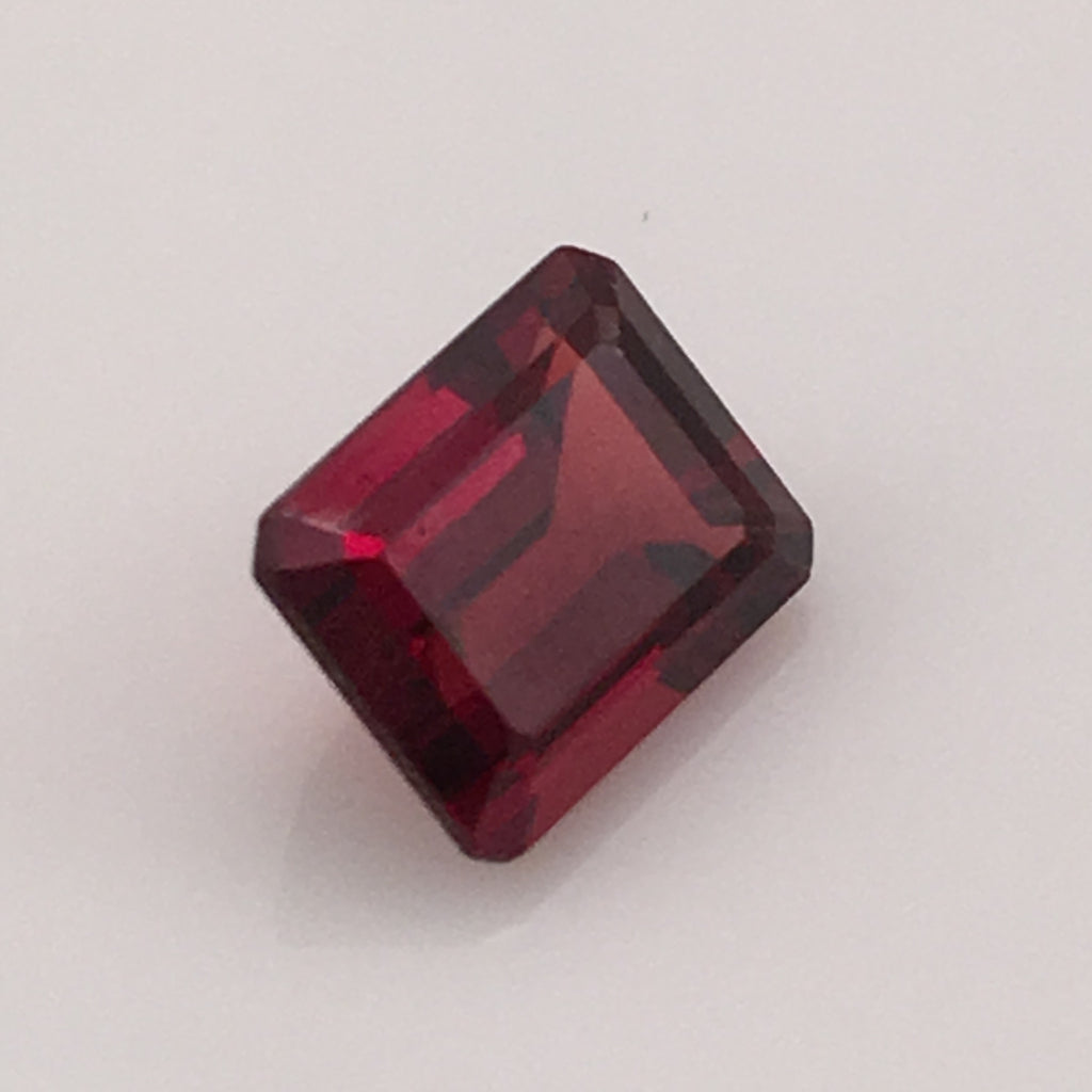 2.7 carat Emerald Cut Rhodolite Garnet Gemstone - Colonial Gems